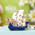 Golden dragon boat keychain with rhinestones and enamel, featuring smooth sailing design - Blue Dragon Boat