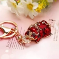 Red Kirin keychain with sparkling rhinestones and gold plating on a gift card - Burgundy Fortune Pixiu