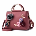 Fashionable dusty rose crossbody handbag with 3D floral embroidery and gold handles - Dusty Pink