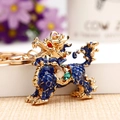 Golden Kirin keychain with blue enamel and sparkling crystals for luxury bag decor - Blue Lucky Kylin