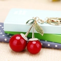 Sparkling red cherry keychain with gold metal stem and green rhinestone leaves - Single OPP Bag Packaging / Rhinestone Cherry