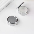 Portable round silver metal pill box with 3 compartments shown in open and closed views - 45mm Round Single-Grid