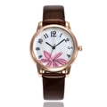 Women's rose gold quartz watch with pink floral dial and dark brown patterned leather strap - Brown