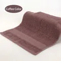 Soft absorbent coffee brown cotton face towel with elegant jacquard woven border design - 34x34cm / Coffee