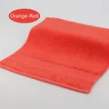 Absorbent soft cotton hand towel in bright orange red with textured honeycomb border detail - 34x34cm / Orange Red