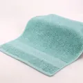 Bamboo green pure cotton hand towel featuring absorbent terry loops and woven border - 34x34cm / Bamboo Green