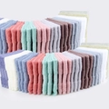 Solid color cotton face towels in multiple pastel shades with ribbed jacquard edges - 34x34cm / Multicolor