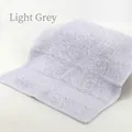 Light grey high-density cotton towel with textured terry loops and jacquard border - 34x34cm / Light Gray