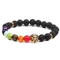 Chakra bracelet with 8mm volcanic lava beads and a gold lion head on white background - Gold