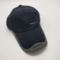 Navy blue outdoor baseball cap with long brim and grey trim featuring Modern British text - Adjustable / Blue