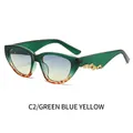 Occhiali da sole cat-eye montatura verde, stanghette dorate e lenti sfumate blu e gialle - Montatura Verde Lente Blu Gialla