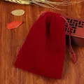 Elegant wine red velvet drawstring jewelry pouch on a vintage wooden table setting - 5*7cm / Burgundy