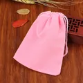 Elegant pink velvet drawstring pouch for jewelry packaging on a rustic wooden background - 5*7cm / Pink