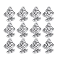 Macro detail of twelve silver metal fish charms with jump rings in a grid layout - Goldfish 12x16mm
