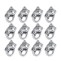 Macro detail of 12 silver fish-shaped metal lobster clasps with scale texture on white - Carp 19x11mm