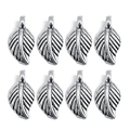 Detailed view of silver leaf-shaped alloy charms with intricate vein texture and rings - Leaf 14.5x7.5mm