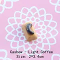 Detailed view of light brown resin cashew chocolate charm for DIY crafts, size 2x3.4cm - Cashew - Light Coffee