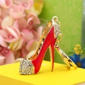 Close-up of red high heel keychain with sparkling crystals and gold metal finish - Red Platform High Heel