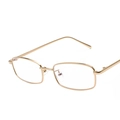 Gafas de sol rectangulares de metal dorado con lentes transparentes para un look de moda - Montura Oro Anti-luz Azul