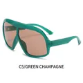 Occhiali da sole oversize monoblocco con montura verde trasparente e lenti color champagne - Montatura Verde Lente Champagne