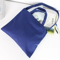 Dark blue canvas tote bag with dual handles and long shoulder strap in a minimalist style - Navy Blue