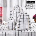 Three-piece set of black and white checkered cotton linen drawstring storage bags - White Plaid