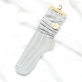 Light grey cable knit slouch socks for women featuring elegant hollow-out texture - One Size / Light Blue