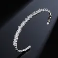 Silver-toned open bracelet featuring baguette-cut zircon in a minimalist luxury design - White Zirconia White Gold Plated