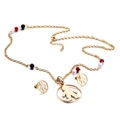 Set gioielli in acciaio al titanio dorato con collana e orecchini a forma di bambino - Oro