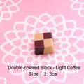 Macro shot of a 2.5cm two-tone resin chocolate square for DIY keychain making - Two-Tone Square - Light Coffee