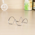 Polished chrome wavy metal taco holder rack placed on a wooden kitchen countertop - Wave Wire Style (2 Slots)