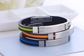 Siliconen en roestvrijstalen armbanden met kleurrijke koordinzetten in blauw, oranje en groen - Zwart