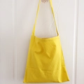 Minimalist yellow canvas tote bag with long shoulder straps for shopping or daily use - Yellow