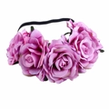Detailed view of the vibrant purple artificial rose petals on a bohemian flower headband - Violet