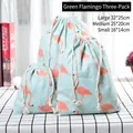 Set of 3 flamingo print cotton linen drawstring bags in large medium and small sizes - Green Flamingo