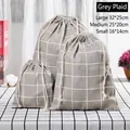 Three gray plaid drawstring storage bags in cotton linen fabric of various sizes - Grey Plaid