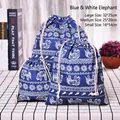 Three-piece set of navy blue cotton linen drawstring bags with white elephant print - Blue Elephant