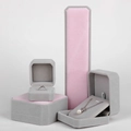 Dusty pink velvet jewelry box set for rings and necklaces on white background - Pinkish Grey