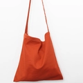 Minimalist orange canvas tote bag with contrast stitching and long shoulder strap - Brick Red