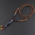 Ethnic 108 wood bead necklace with blue sandstone pendant and multi-color accents - Resin Blue Bar