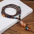 Ethnic wood bead long necklace with vintage amber resin pendant and colorful tassels - Resin Flesh Color Ball