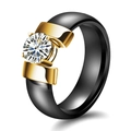 6mm black ceramic ring with gold mounting and round cubic zirconia in a 45-degree view - US 5 / Black + Gold
