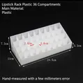 Detail view of 36-slot tiered acrylic lipstick organizer with 24.5cm length dimensions - 36-Grid White Plastic Lipstick Rack