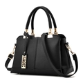 Classic black litchi pattern handbag with gold hardware and hollow tree pendant - Black