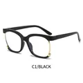 Glossy black frame glasses with gold metal accents and large lenses in C1 colorway - Bright Black