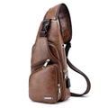 Brown leather crossbody chest bag with USB charging port and multiple zipper pockets - Regular Fit / Tan