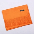 Classic orange cashmere scarf with tassel fringe folded neatly on white background - Orange / 68x200cm
