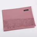 Pink cashmere scarf with fringe tassels folded on a clean white background - Dusty Pink / 68x200cm