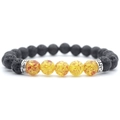 8mm black lava stone bracelet with amber resin beads and silver spacers on white background - Flower Amber
