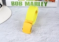 Detailed view of yellow nylon canvas belt with matching matte spray paint buckle - Light Yellow